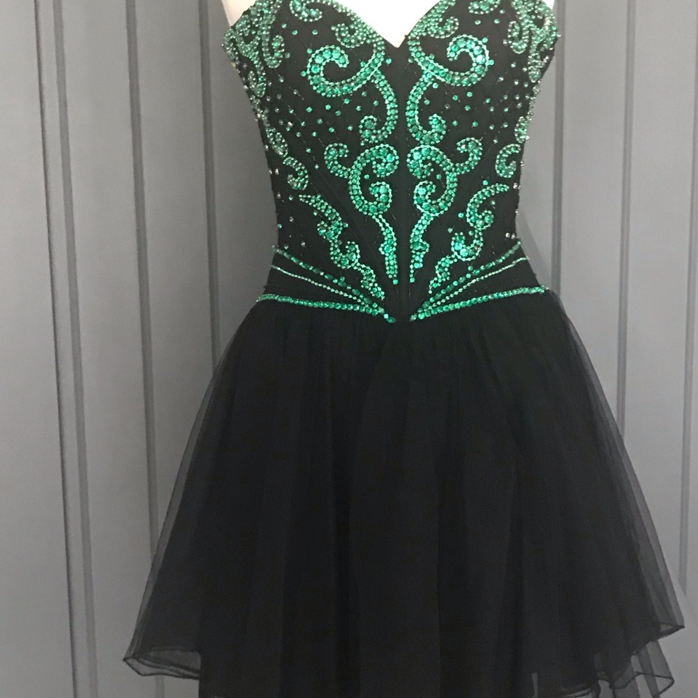Sherri Hill black cocktail it’s green stones